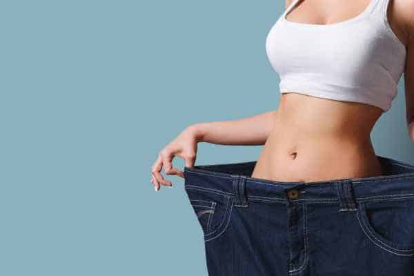 woman after fat reduction treatment Rhyl