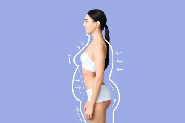image of woman experiencing fat reduction treatment Rhyl