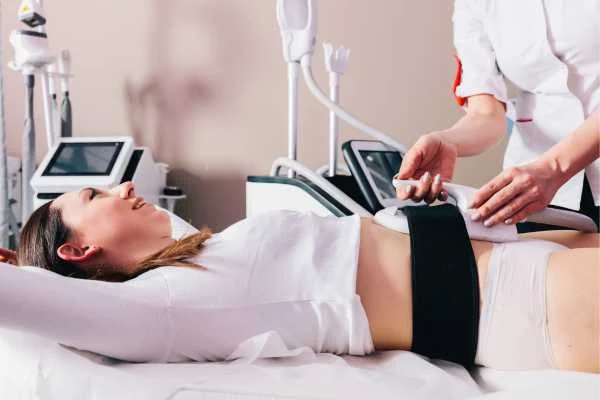 woman having body sculpting to help improve her body image and her mental health Rhyl